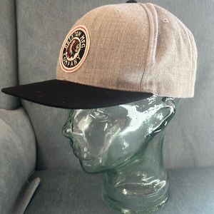 Grey Brixton Mfg adjustable hat with navy lid